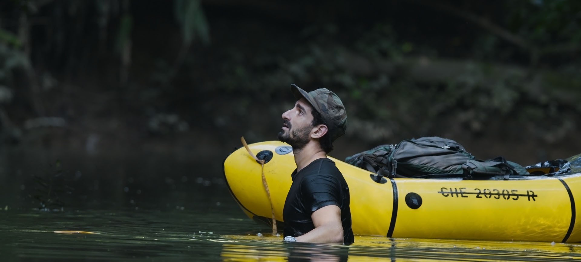 This image shows the Las Piedras river in the Amazon with a man.jpg